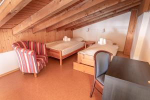 Postel nebo postele na pokoji v ubytování Hôtel Les Sources