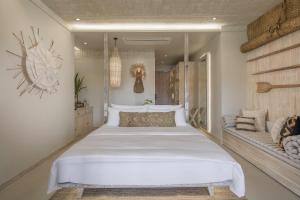 Ein Bett oder Betten in einem Zimmer der Unterkunft Phangan Bayshore Resort Koh Phangan