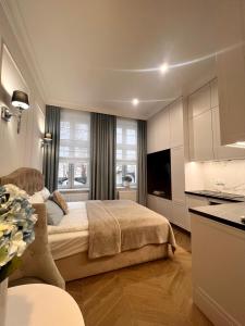 Posteľ alebo postele v izbe v ubytovaní La Boutique Studio Sopot