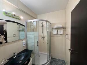 Koupelna v ubytování Hotel Helin Aeroport - Craiova