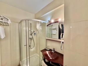 Koupelna v ubytování Hotel Helin Aeroport - Craiova