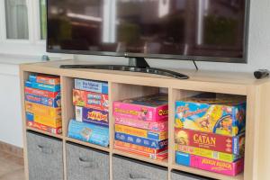TV a/nebo společenská místnost v ubytování Ferienhaus Heidi