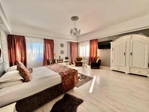 Postel nebo postele na pokoji v ubytování Hotel Helin Aeroport - Craiova