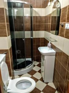Phòng tắm tại Hotel Sportowy