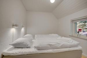 Postel nebo postele na pokoji v ubytování BLÅBJERGGAARD - Hennebysvej 58