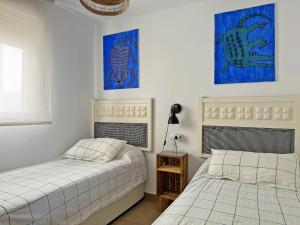 Posteľ alebo postele v izbe v ubytovaní Apartamento Dunas Candor - Ole Solutions + 25 fotografií