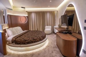 Telewizja i/lub zestaw kina domowego w obiekcie Mattis Hotel