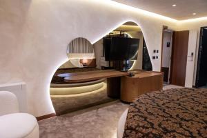 Telewizja i/lub zestaw kina domowego w obiekcie Mattis Hotel