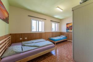 Posteľ alebo postele v izbe v ubytovaní Casa Resi
