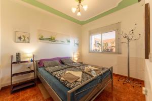 Postel nebo postele na pokoji v ubytování Casa Resi