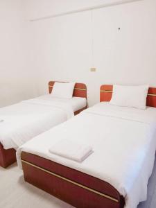 Giường trong phòng chung tại GO INN Maya - Nimman Chiang Mai