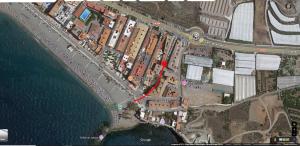 a map of a road with a red circle at Apartamento Torrenueva en playa 4 planta in Torrenueva