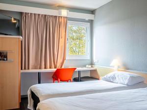 Postel nebo postele na pokoji v ubytování ibis Bayonne Centre + 37 fotografií