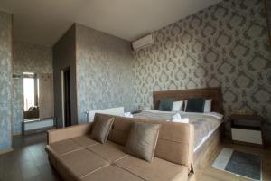 Postel nebo postele na pokoji v ubytování Prestige Guest House