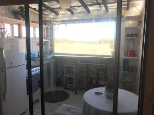 Kuchyň nebo kuchyňský kout v ubytování Ohana frente al mar