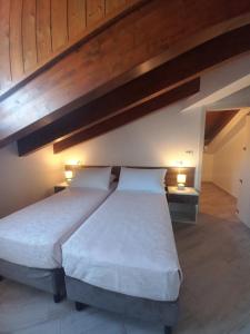 Postel nebo postele na pokoji v ubytování Appartamento Il Riccio home & relax