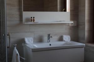 Koupelna v ubytování Appartamento Il Riccio home & relax + 34 fotografií