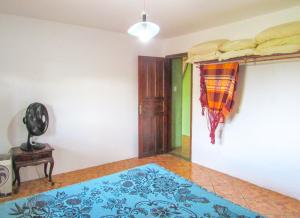 Postel nebo postele na pokoji v ubytování Linda casa a 170m da Praia do Pero em Cabo Frio RJ + 18 fotografií