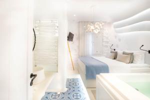 A bathroom at AMMOS at AmazeU Suites Naxos