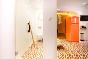 A bathroom at AMMOS at AmazeU Suites Naxos