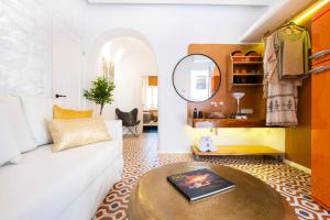 A seating area at AMMOS at AmazeU Suites Naxos