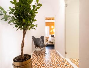 A seating area at AMMOS at AmazeU Suites Naxos