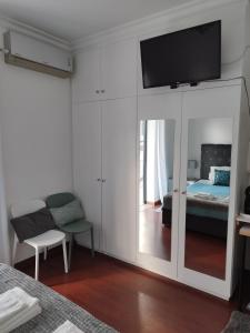 TV a/nebo společenská místnost v ubytování Alexia Room