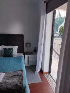 Postel nebo postele na pokoji v ubytování Alexia Room