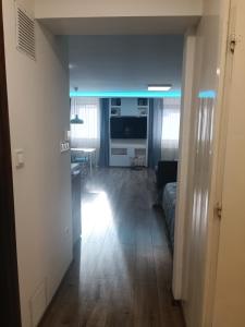 Kuchyňa alebo kuchynka v ubytovaní Tp Apartman