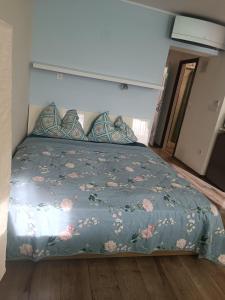 Posteľ alebo postele v izbe v ubytovaní Tp Apartman