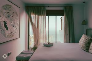 Postel nebo postele na pokoji v ubytování Villa Atalaya By Abahana Luxe