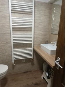 Kúpeľňa v ubytovaní Tp Apartman