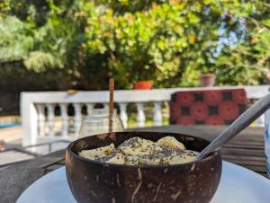a bowl of food sitting on a table at Arijaana Guesthouse in Gunjur