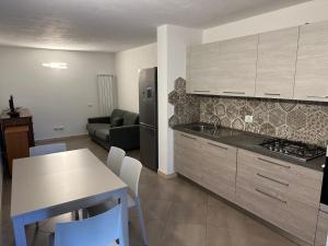 Kuchyň nebo kuchyňský kout v ubytování Les Achantes