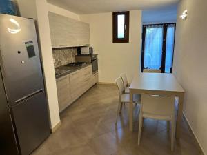 Kuchyň nebo kuchyňský kout v ubytování Les Achantes