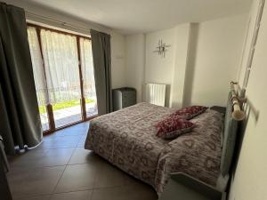 Postel nebo postele na pokoji v ubytování Les Achantes