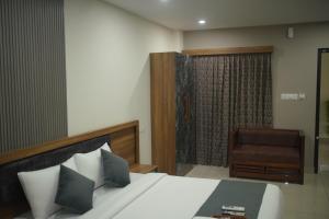 Fotografie z fotogalerie ubytování Cruz Inn calicut v destinaci Kóžikkót