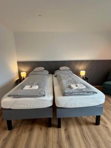Una cama o camas en una habitación de Bodensee Stadtapartment