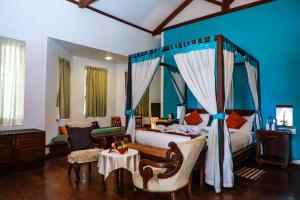 Posezení v ubytování Old Lighthouse Bristow Hotel , Fort Kochi + 37 fotografií