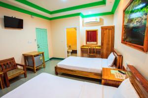 TV a/nebo společenská místnost v ubytování Pailin Resort