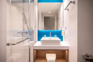 Koupelna v ubytování Holiday Inn Express & Suites Ghent by IHG