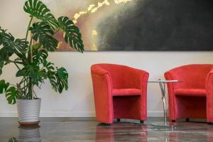Posezení v ubytování Hotel Villa Paradiso Suite