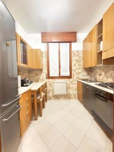 a kitchen with a sink and a stove at Casablanca in Venice
