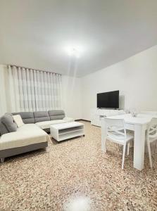 a living room with a couch and a table at Casablanca in Venice