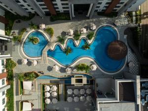 an overhead view of a pool at a resort at Glee Nairobi, a Preferred LVX Hotel in Nairobi