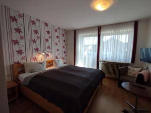 Postel nebo postele na pokoji v ubytování Pension Erika + 23 fotografií