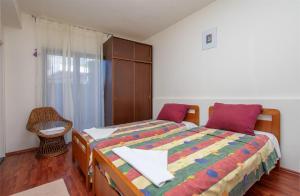 Posteľ alebo postele v izbe v ubytovaní Apartment Iva