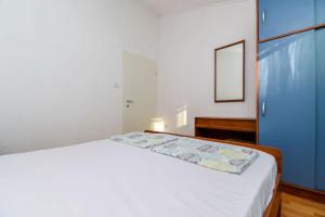 Postel nebo postele na pokoji v ubytování Apartment Denis