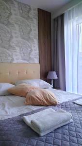 Posteľ alebo postele v izbe v ubytovaní Willa Długa No. 4 Bed & Breakfast