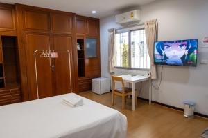 TV a/nebo společenská místnost v ubytování Seven Rabbit House